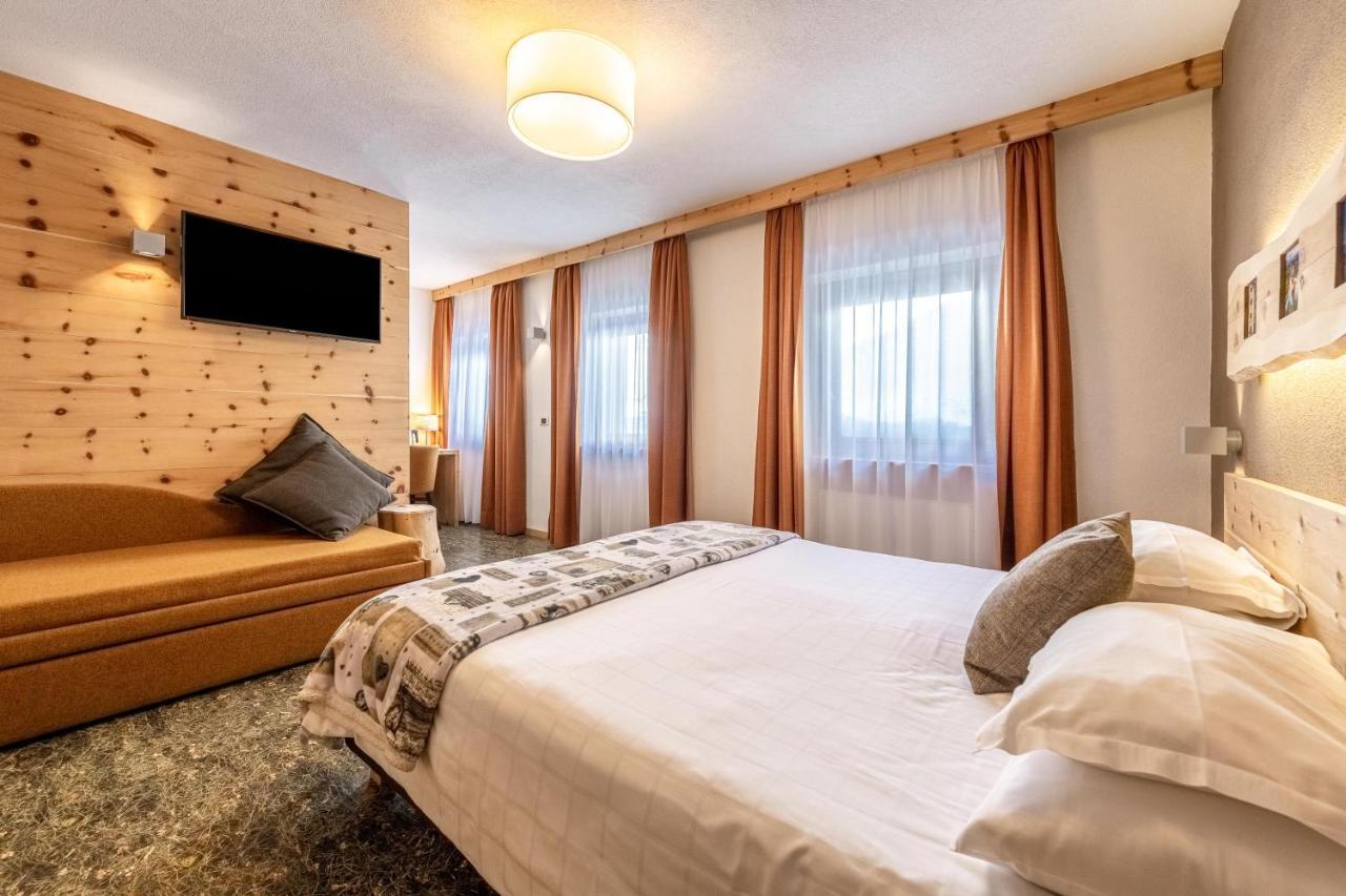 Dreibettzimmer mit Bergblick